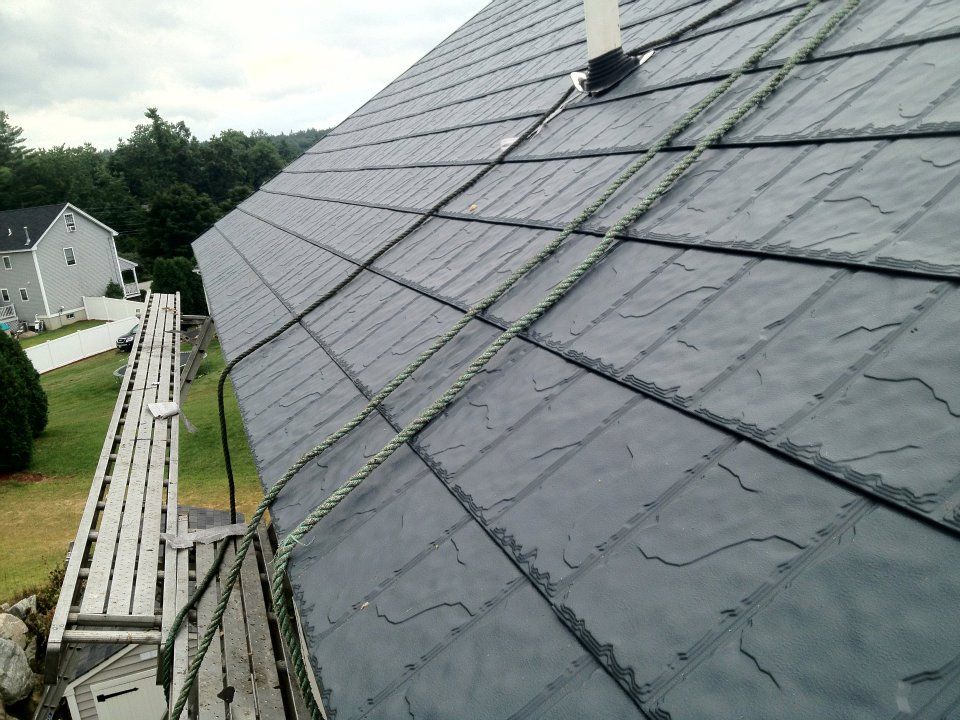 A roof with a scaffolding attached to it