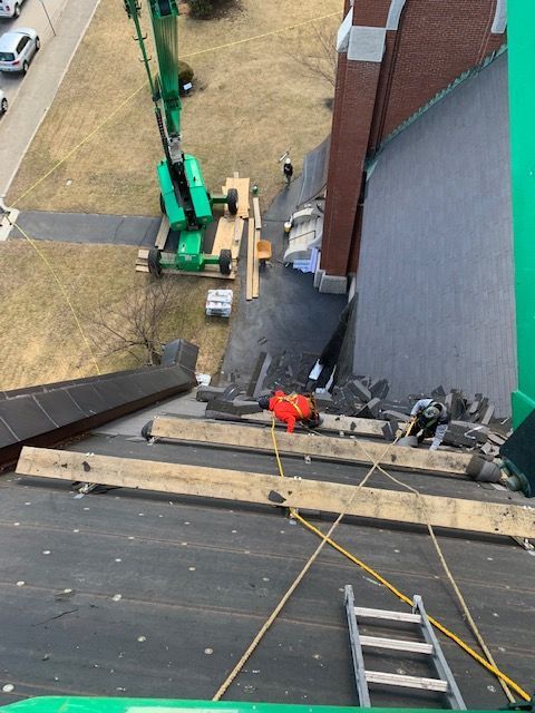 An aerial view of a construction site with a ladder and a crane.