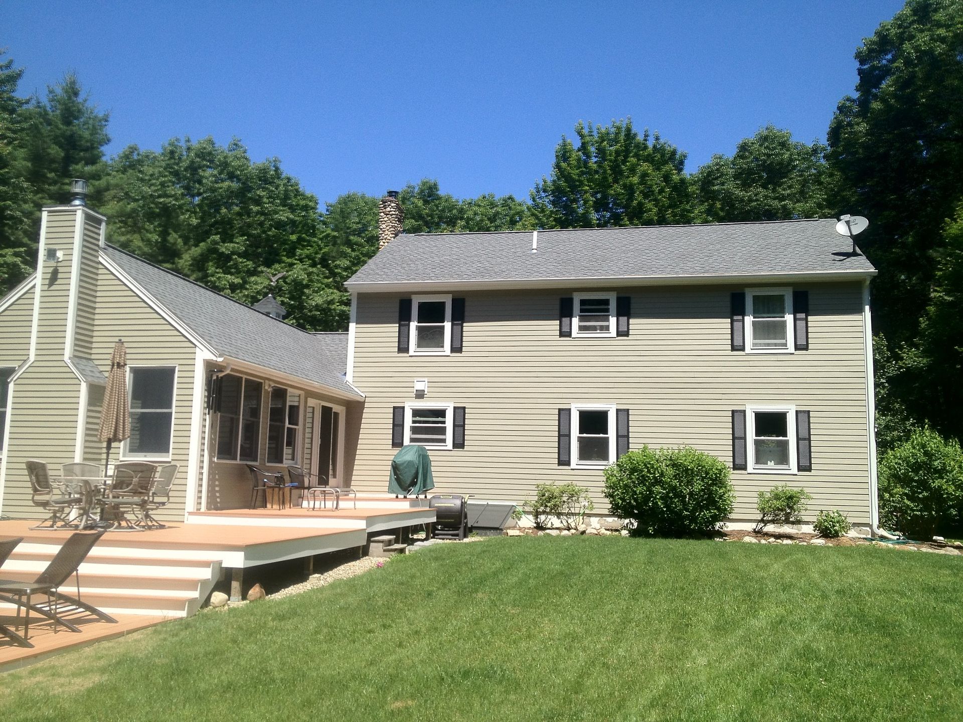 The back of a house with a large deck