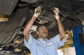 Man fixing under car
