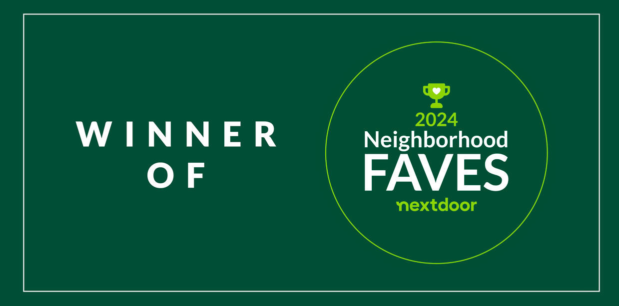 A green sign that says winner of neighborhood faves nextdoor