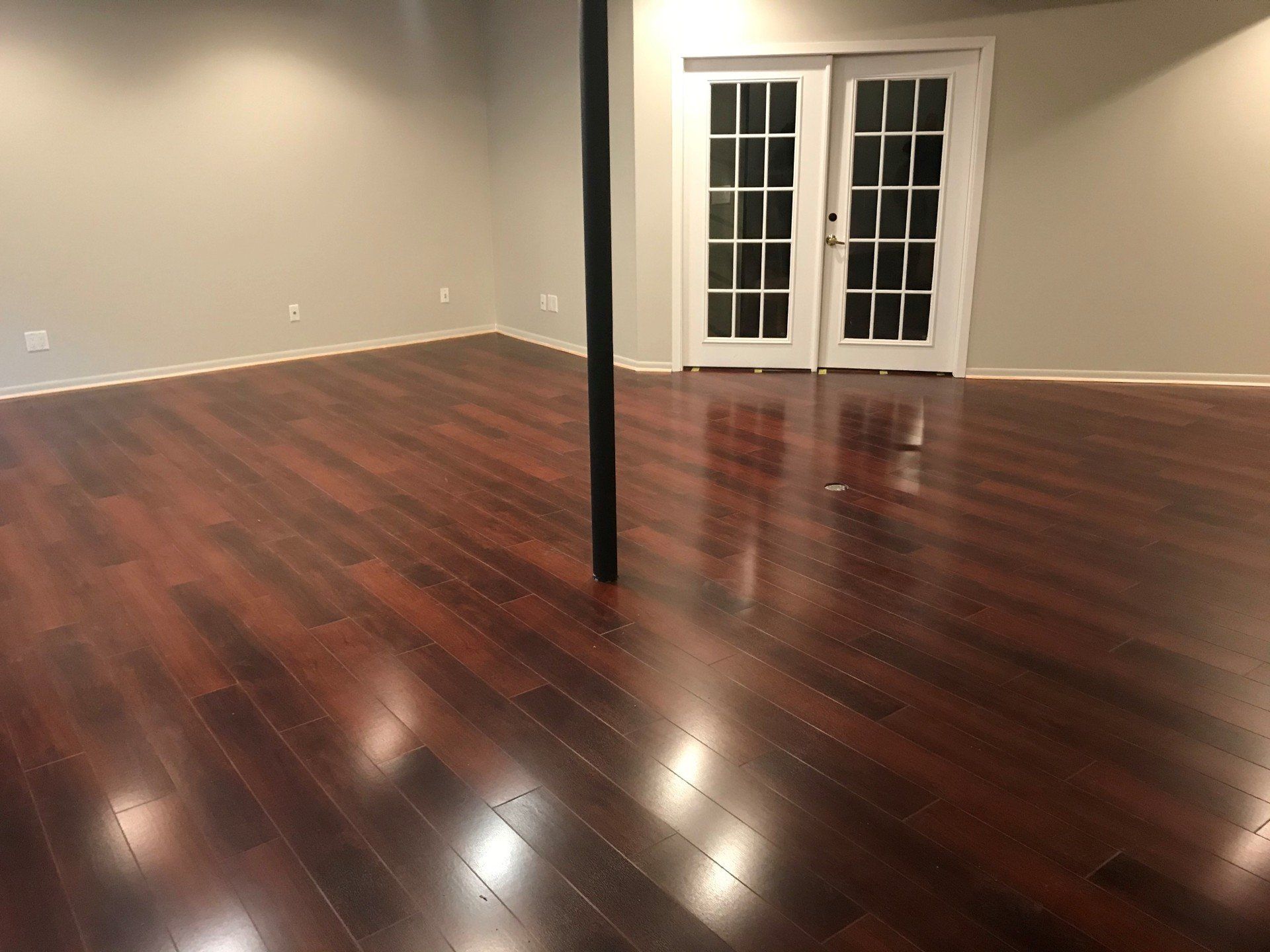Basement Remodeling Contractor; Wood Laminate Flooring