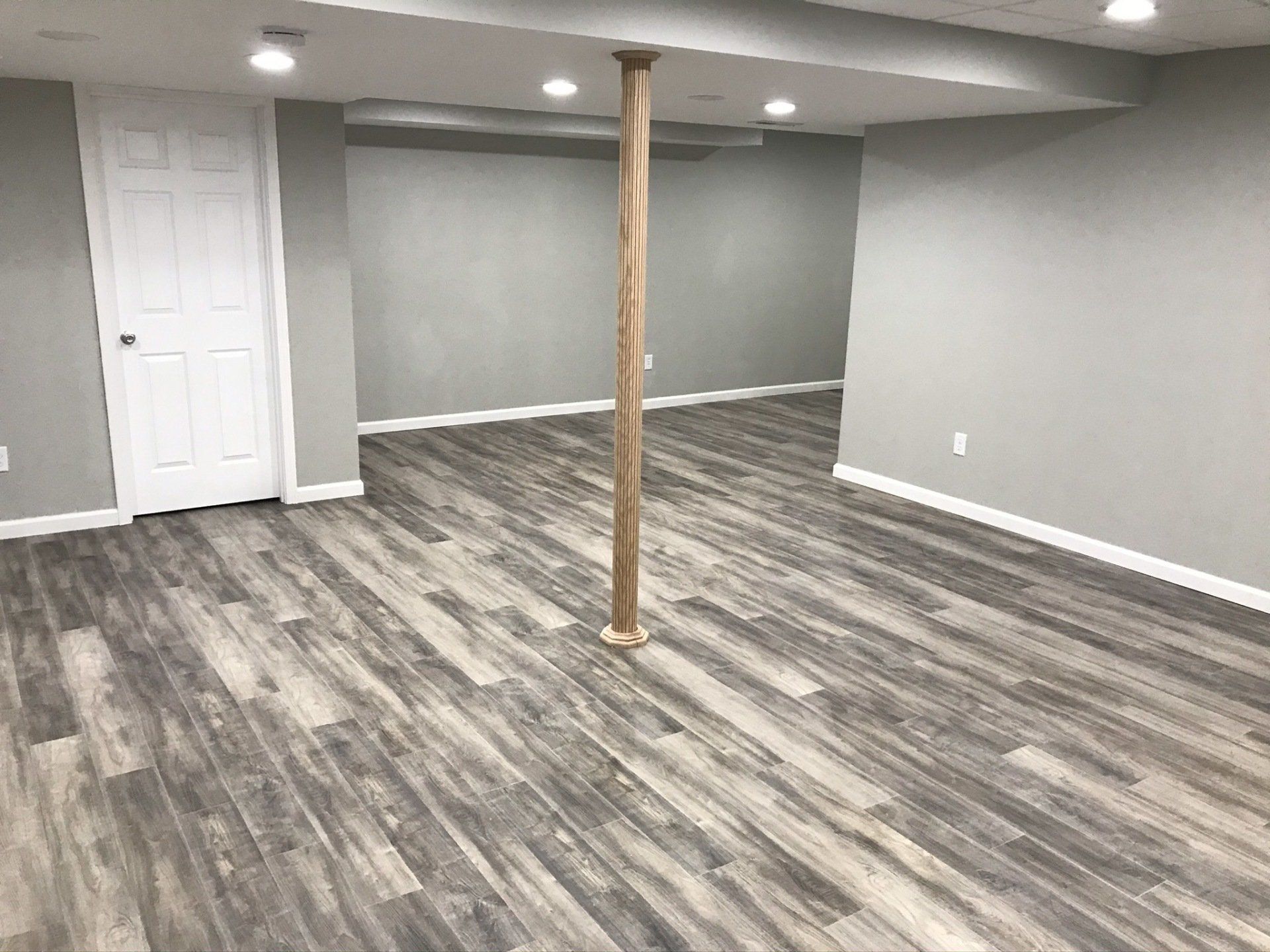 Waterproof Laminate Flooring, Basement Remodeling Contractor