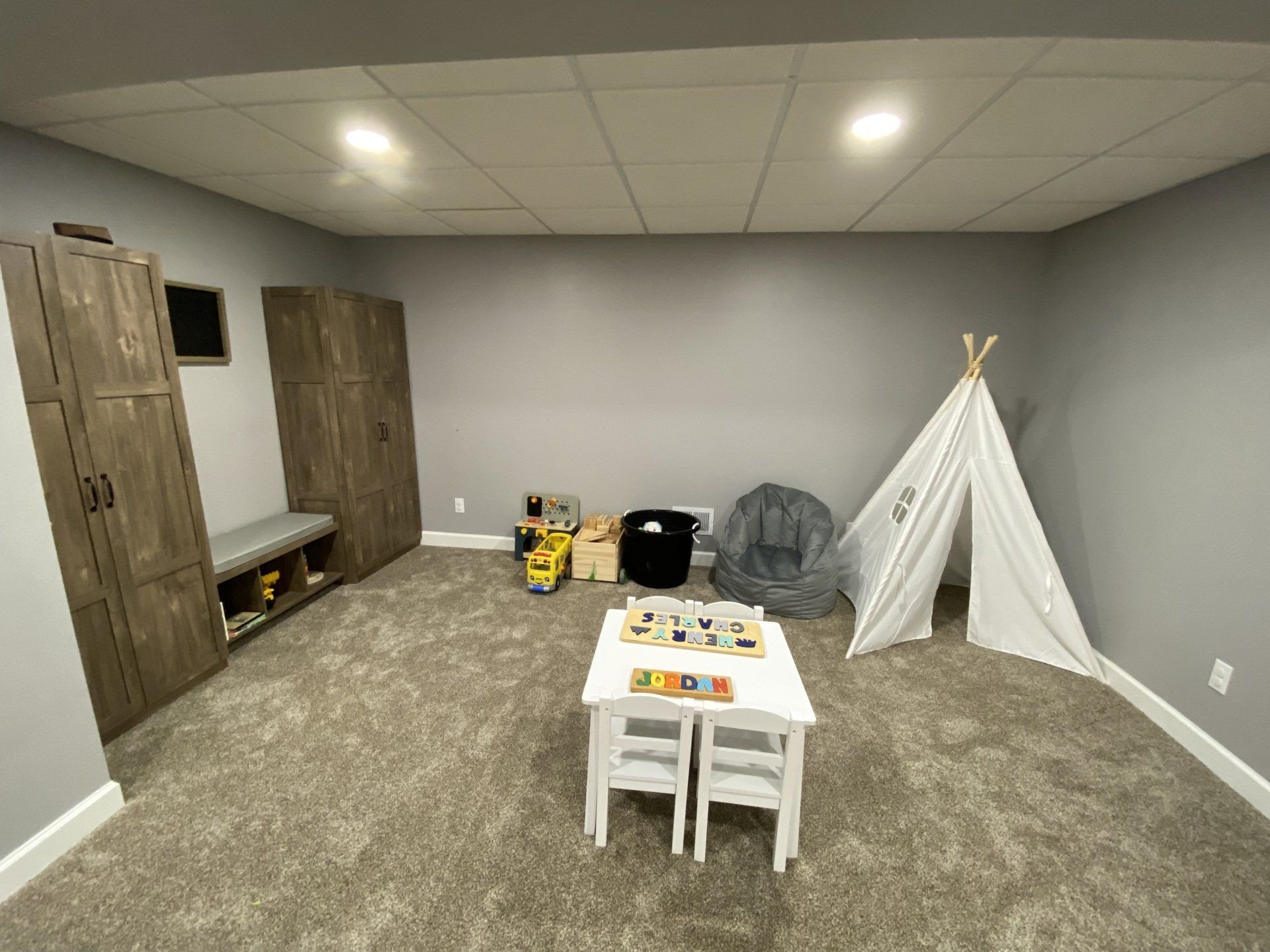 There is a teepee in the middle of the room.