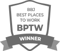 A black and white badge that says `` best places to work bptw winner ''.