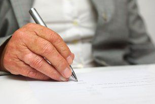 A man writing a will