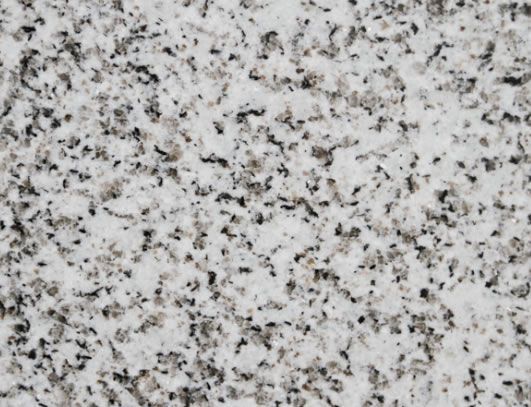 White granite countertop with black and gray flecks.