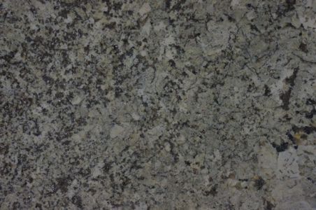 Granite countertop with speckled gray and dark brown patterns.