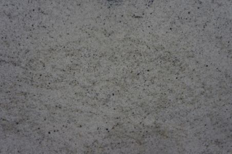 Granite surface with a white and gray speckled pattern.