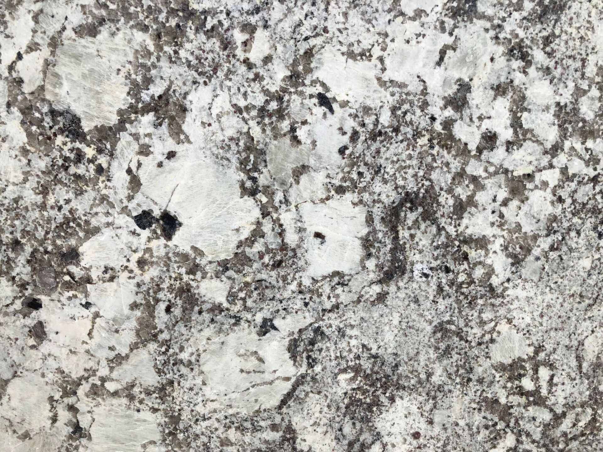 White and gray speckled granite texture.