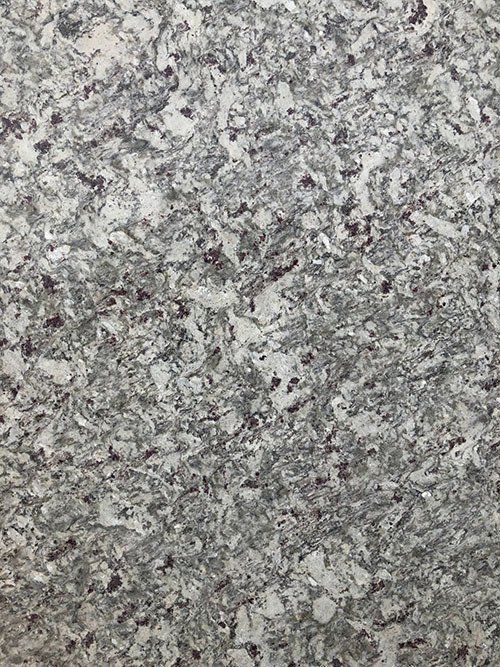 Granite surface with gray, white, and dark flecks.
