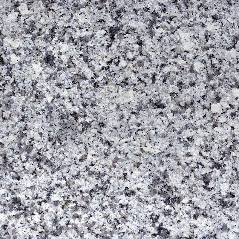 Gray and white granite stone surface.