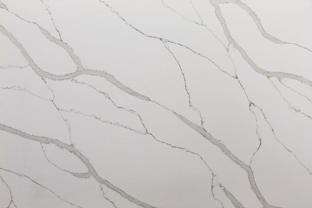 White quartz countertop with gray veining.