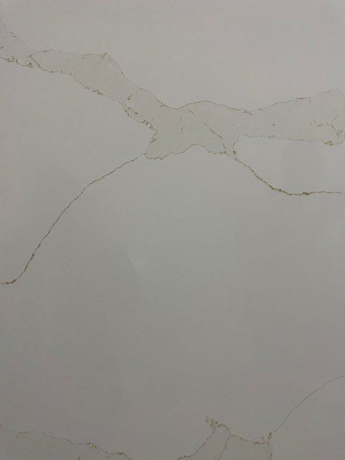 White countertop with beige veining.