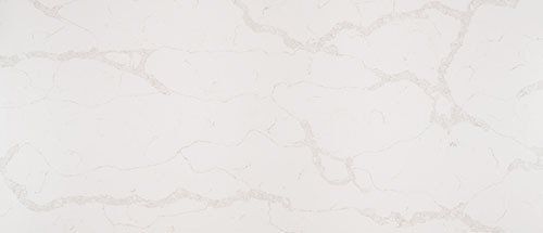 White marble surface with subtle grey veining.