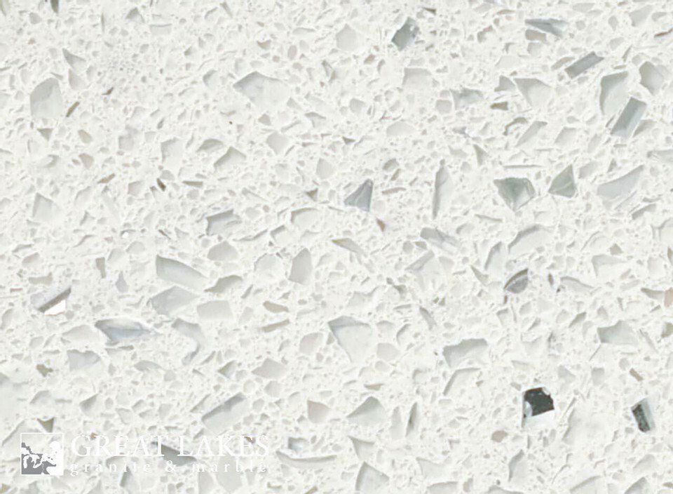 White quartz countertop with scattered gray and clear flecks.