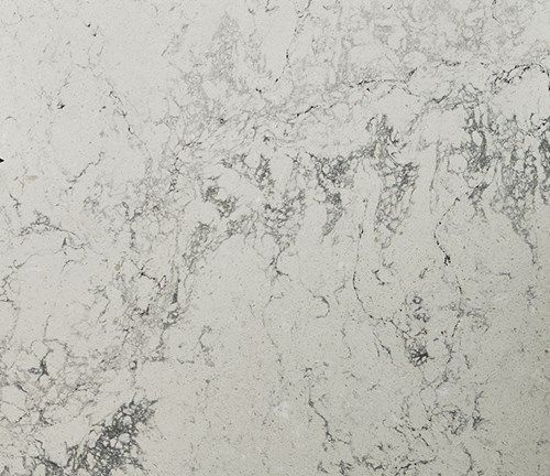 Light gray and white quartz countertop with subtle veining patterns.