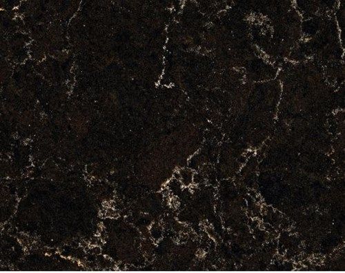 Dark brown countertop with white veining.