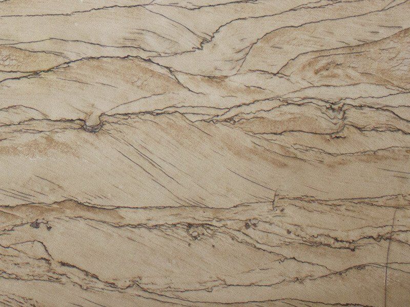 Tan granite with dark brown veins and swirly patterns.