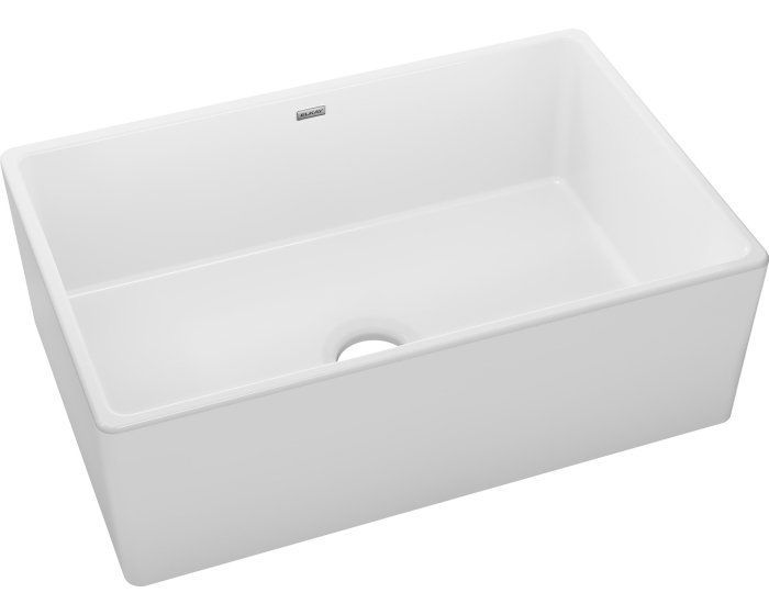 White rectangular farmhouse-style kitchen sink with a single centered drain hole.