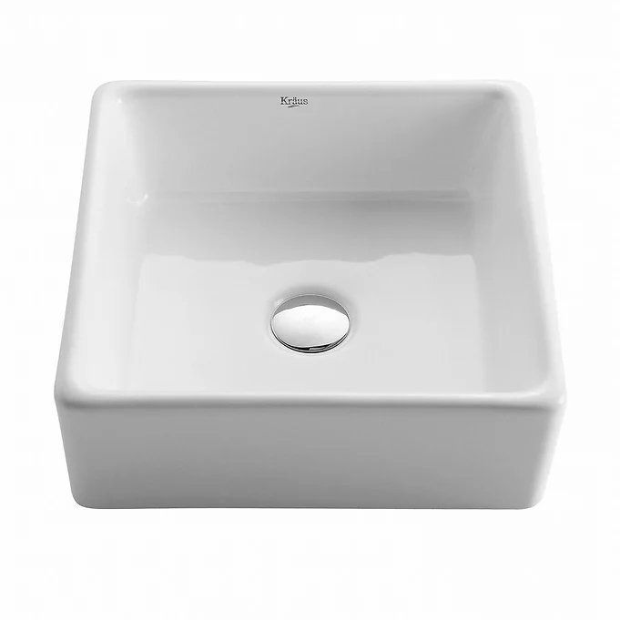 White square ceramic bathroom sink with chrome drain.