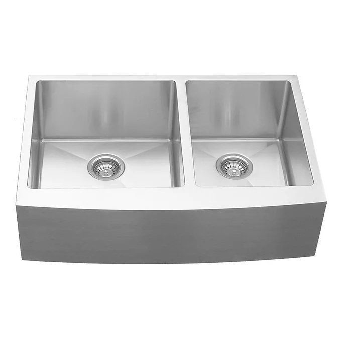 Stainless steel, double-basin kitchen sink with a farmhouse apron front.