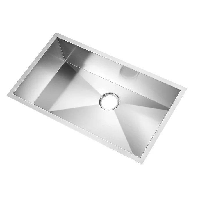 Stainless steel rectangular kitchen sink with drain hole.