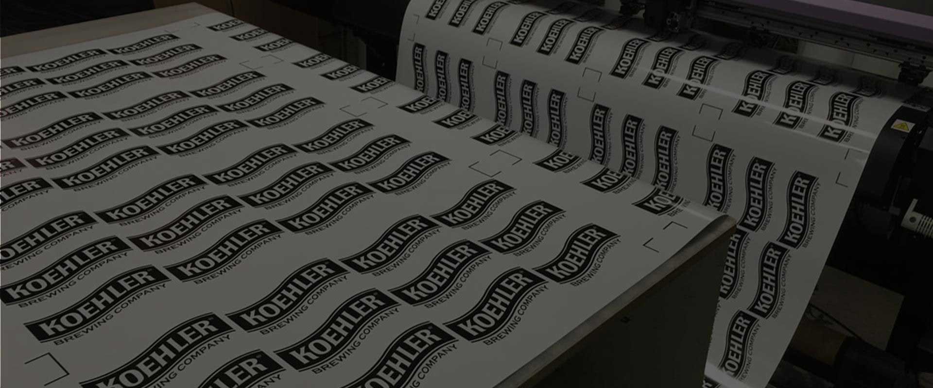 A printing machine printing multiple labels with the word