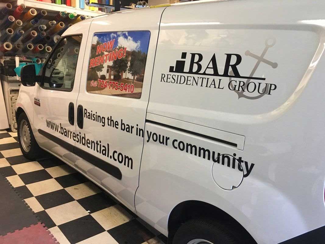 White van with advertising for 
