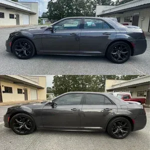 Two side-view photos of a dark gray sedan parked outdoors, showing different heights or stances.