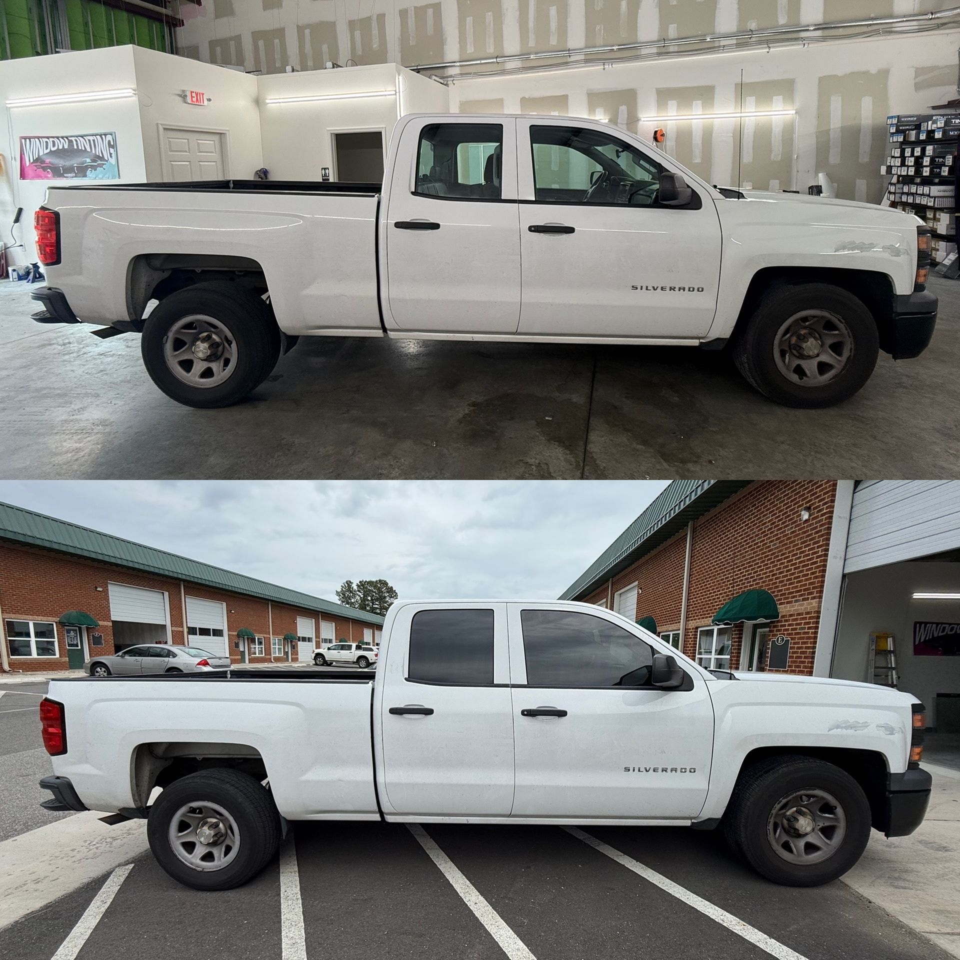 White pickup truck in a dealership bay and parked outside on a rainy lot, shown side view