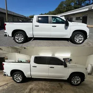 White pickup truck shown in side view, in an outdoor lot and indoor garage.