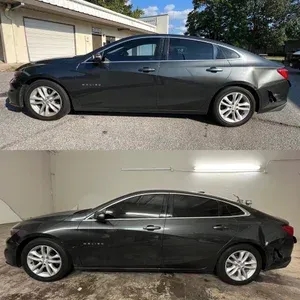 Black sedan shown in two side views, parked outside a garage and indoors under fluorescent lighting.