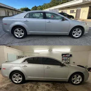 Silver sedan shown in side view outdoors and indoors in a garage-like space