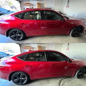 Red sedan parked in a garage, shown from the side in two nearly identical views.