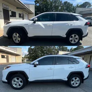 White SUV parked outdoors, shown in side profile from two angles.