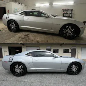 Silver two-door sports coupe shown in side view in a garage and a building lot, from two angles