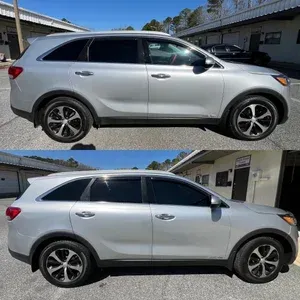 Silver SUV parked outdoors, shown in side view from two slightly different angles.