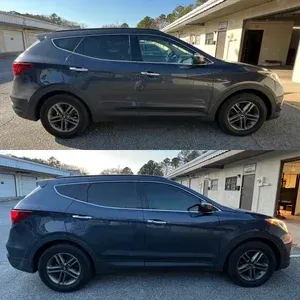 Dark gray SUV parked in a driveway, shown in two side-profile views.