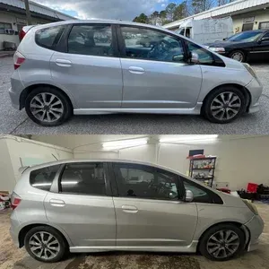 Silver compact hatchback shown in side view, outdoors and indoors in a garage.