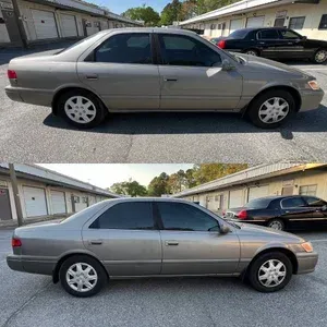 Silver four-door sedan parked in a lot, shown from the side in two similar photos.