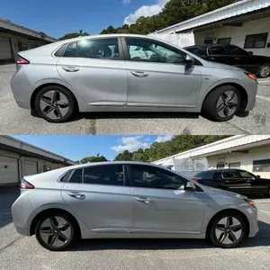 Silver sedan shown from side view in two nearly identical photos, parked outdoors near a building.