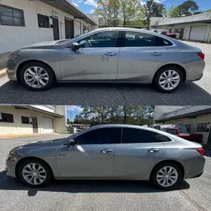 Silver sedan parked in a driveway, shown in side view from two angles.