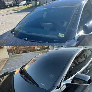Two views of a black car’s windshield and hood in bright daylight.