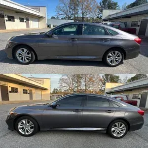 Gray sedan in a side-by-side comparison, parked outdoors in a driveway with buildings in the background.