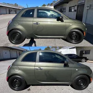 Two side-view photos of a gray compact car with black wheels parked outside homes.