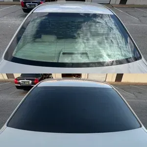 Top and bottom view of a car windshield before and after a dark tint is applied