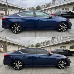 Blue sedan shown in two side views, with slightly different window tint and wheel styling