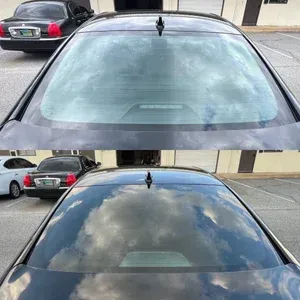 Car windshield before and after clearing condensation, showing cloudy glass and then a clear reflection of clouds.