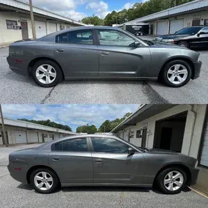 Gray sedan parked in front of a building, shown in side view from two angles.